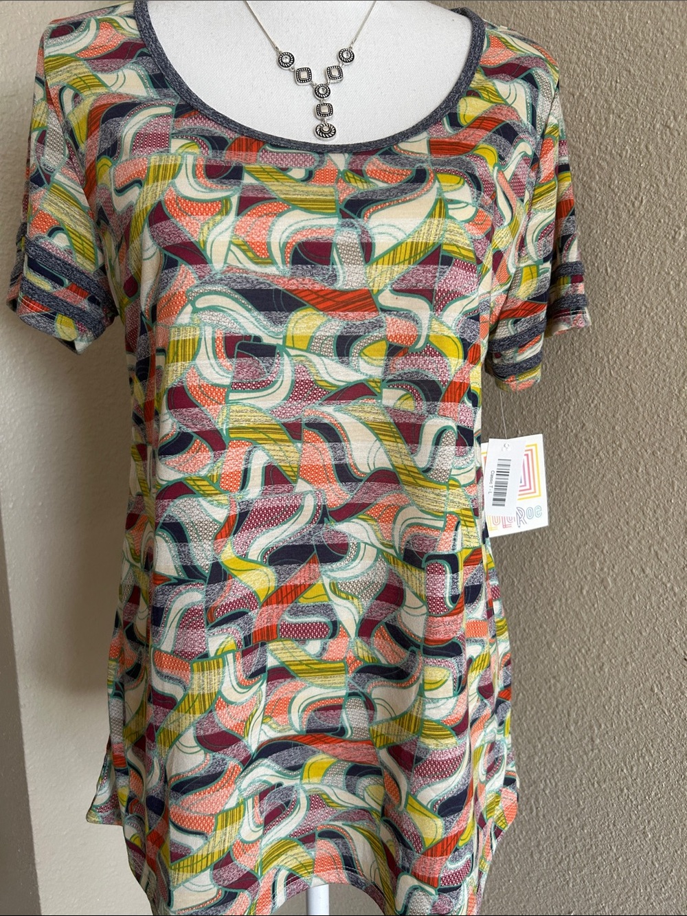 LuLaRoe Short Sleeve Scoop Neck Top in Coral, Yellow, Navy, Cream & Green